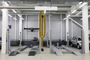 Vehicle Lifts and Other Tools Seen in a Clean Auto Shop
