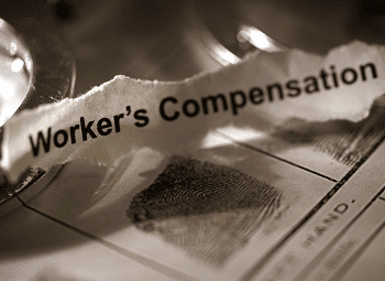 Torn piece of paper with worker's compensation typed on it
